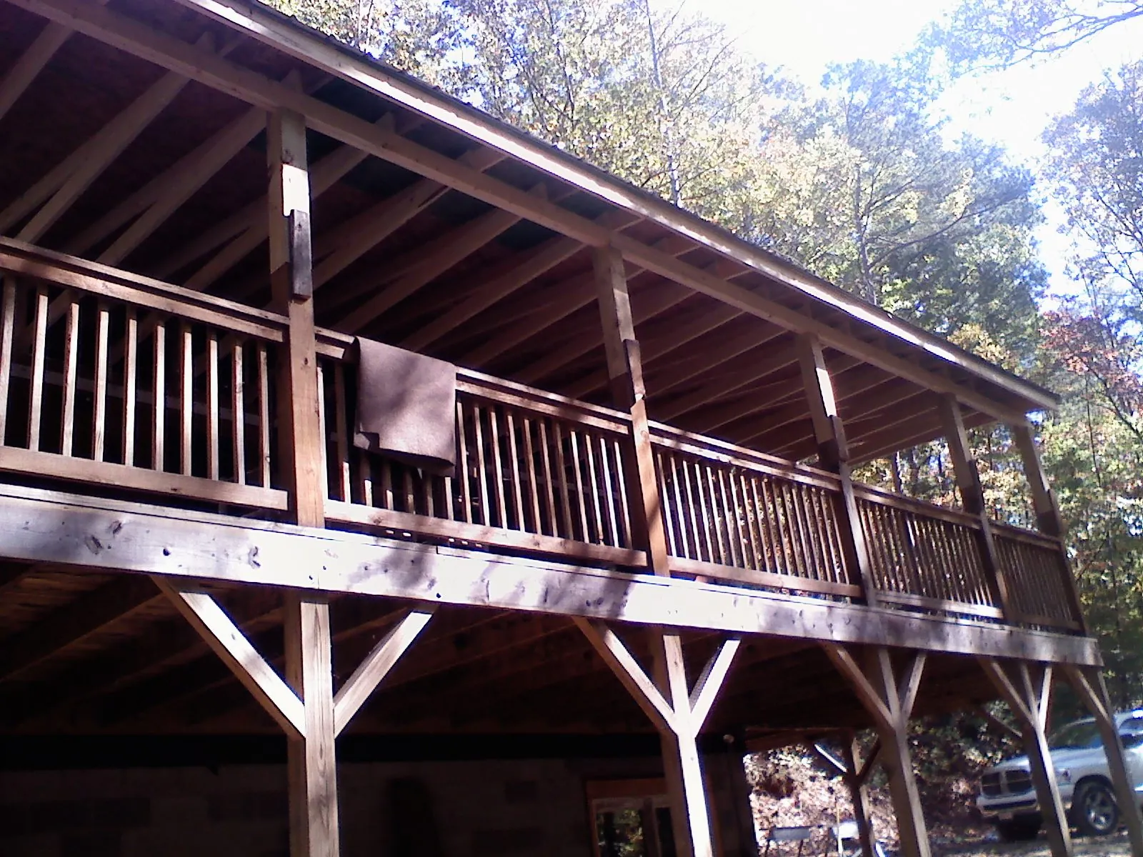 Timber framing under a new elevated porch and deck in New Ringgold